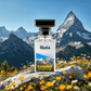 Blissful Kashmir Eau de Parfum bottle on rock with yellow flowers and snowy mountain backdrop