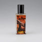 Blisstrol White Ball cologne bottle with black cap and orange label featuring wood design